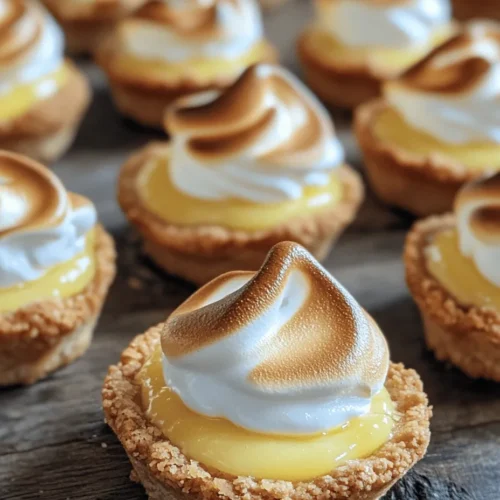 Mini lemon meringue pies are the epitome of a perfect dessert—delightful, refreshing, and visually stunning. These little bites of joy are not just a treat for the taste buds but also a feast for the eyes, making them an excellent choice for any gathering or special occasion. The dessert is a harmonious blend of tart lemon filling and sweet, fluffy meringue, which creates a balance that appeals to dessert lovers of all ages. Whether served at a summer barbecue, a wedding reception, or a cozy family dinner, mini lemon meringue pies are sure to impress your guests and leave them craving more.