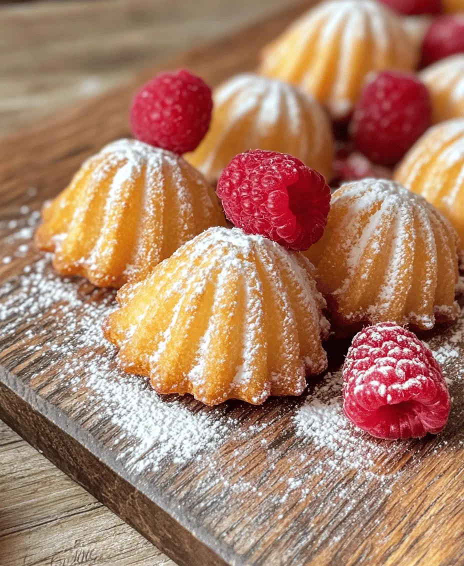 Madeleines, those charming little shell-shaped cakes, are a classic French pastry that has captured the hearts of dessert lovers around the world. Known for their delicate texture and buttery flavor, these treats are often associated with afternoon tea or as a sweet accompaniment to coffee. The addition of fresh lemon and raspberry to the traditional madeleine recipe elevates this simple pastry to a whole new level, creating a delightful balance of tart and sweet. Imagine the light, airy bite of a madeleine infused with the refreshing zest of lemon and the vibrant burst of raspberries—pure bliss!