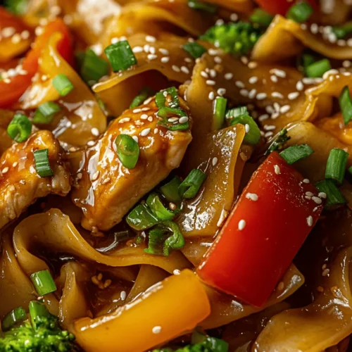 In the realm of culinary delights, few dishes evoke as much excitement as Chicken Teriyaki Noodles. This vibrant and flavorful dish is a beautiful fusion of tender chicken, crisp vegetables, and perfectly cooked noodles, all enveloped in a sweet and savory teriyaki sauce. Its appeal is universal, transcending cultures and satisfying appetites at dinner tables around the world.