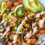 As the weather warms up, nothing beats a refreshing, vibrant meal that showcases the best of seasonal ingredients. The Grilled Shrimp Bowl with Avocado, Corn Salsa, and Creamy Sauce is the perfect dish to enjoy during those sunny days or at gatherings with friends and family. This recipe is not only visually appealing with its colorful presentation but also packed with flavors that will awaken your taste buds.